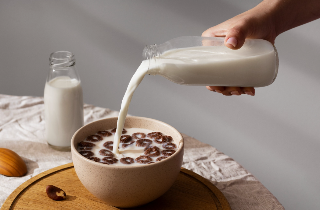 opened container of fresh milk demonstrating proper Kuwaiti refrigeration techniques.
