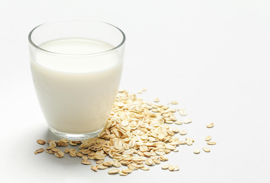 Lactose intolerance symptoms and causes, explained with alternatives like almond and coconut milk.